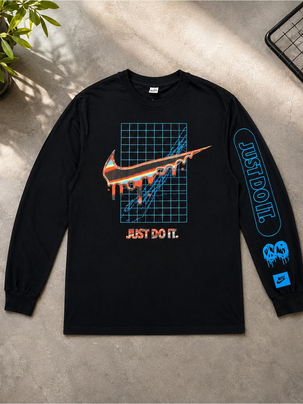 Nike Black Long-Sleeve Tee with Orange Drip Swoosh and Blue Accents